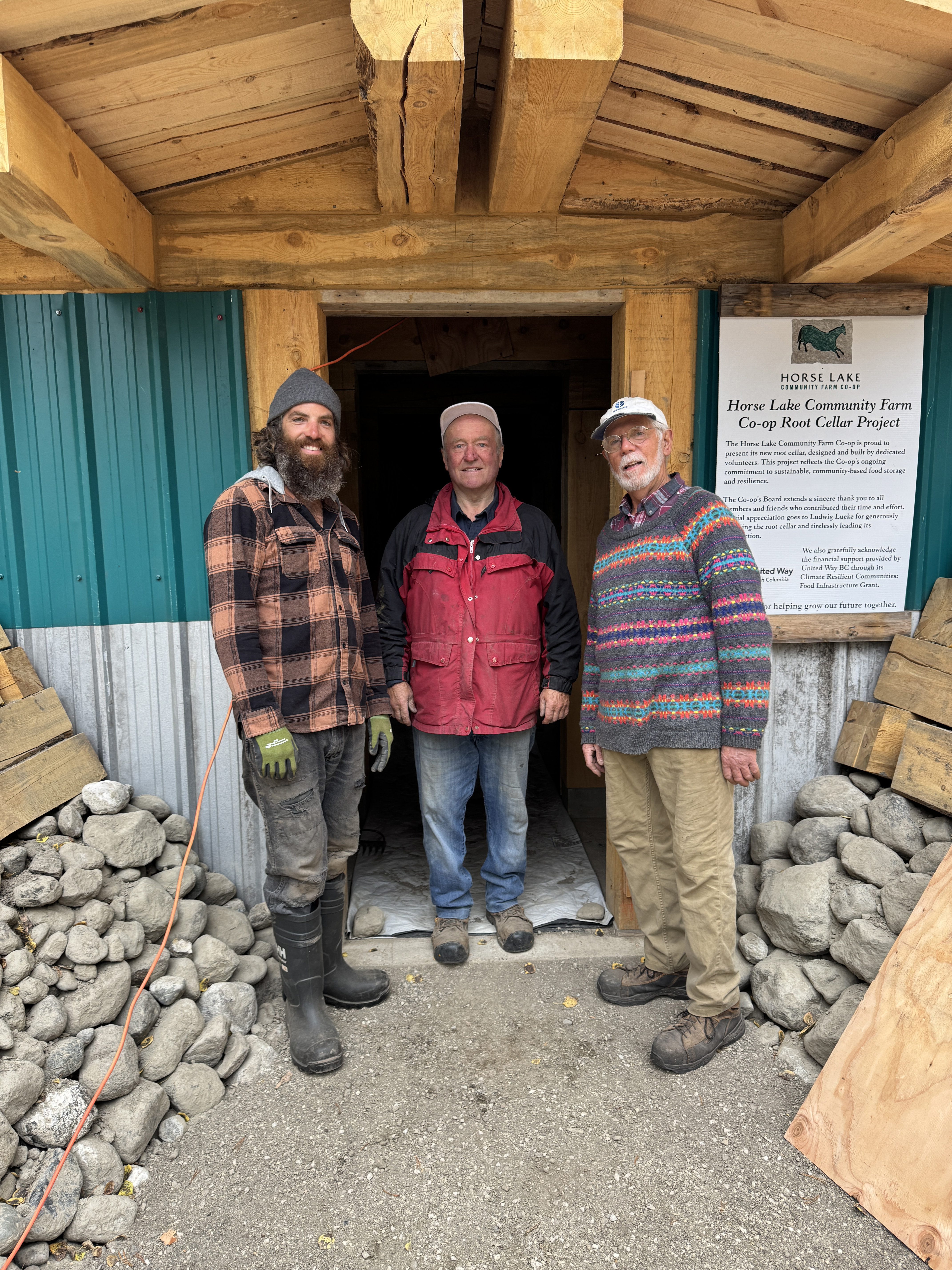 Tyson, Ludwig and Rob outside the completed root cellar